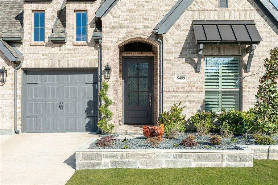 Exterior details and patio area of a home in Trinity Falls, McKinney (Image 3).
