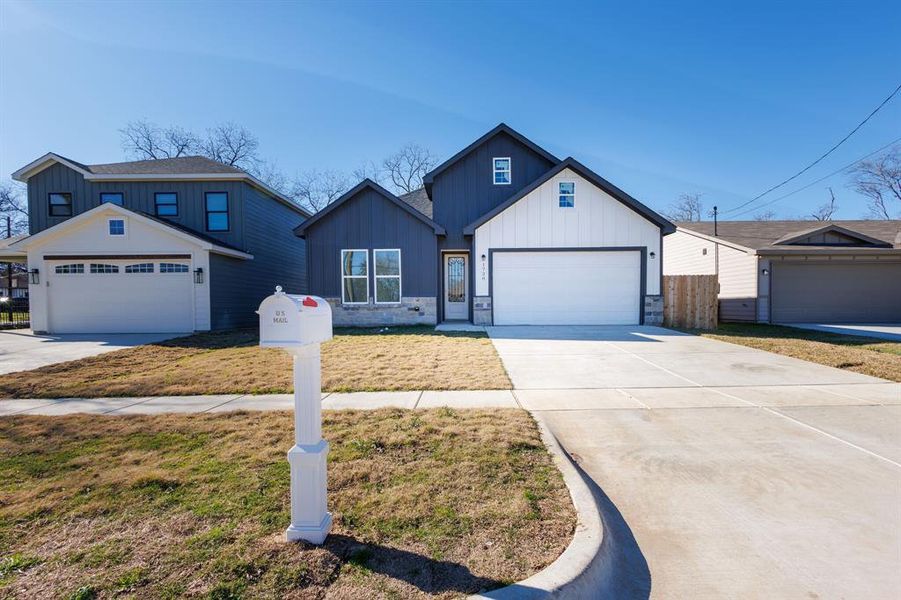 View of front of house with a front yard