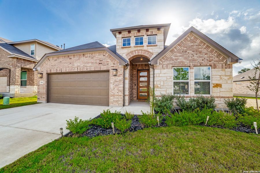 Front exterior of a new home in Veranda, San Antonio, TX, highlighting curb appeal (Image 1). Front exterior of a new home in Veranda, San Antonio, TX, highlighting curb appeal (Image 1).