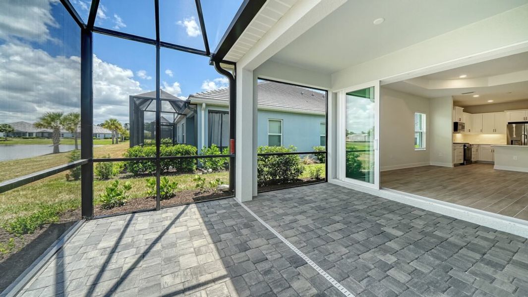 Exterior details and patio area of a home in Windward Real Estate and Homes for Sale in Sarasota, FL - Neal Communities, Lakewood Ranch (Image 21).