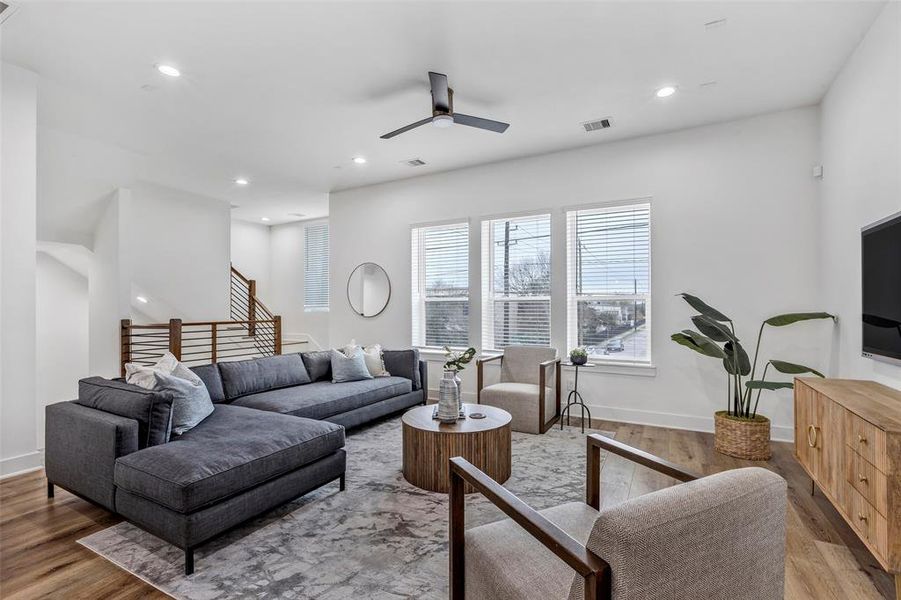 Another perspective of the living room, offering a fresh view of the spacious layout and inviting atmosphere.