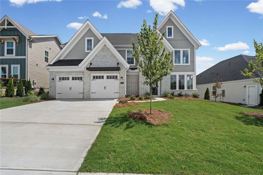 Front exterior of a new home in Twin Lakes, Hoschton, GA, highlighting curb appeal (Image 22).