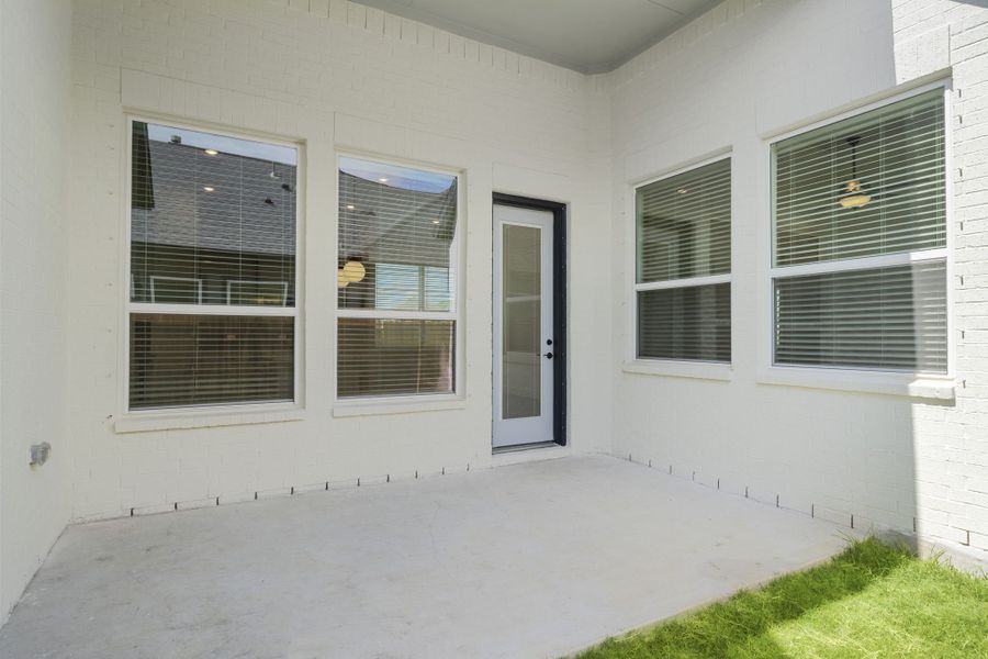 Exterior details and patio area of a home in Riceland, Mont Belvieu (Image 3). Exterior details and patio area of a home in Riceland, Mont Belvieu (Image 3).