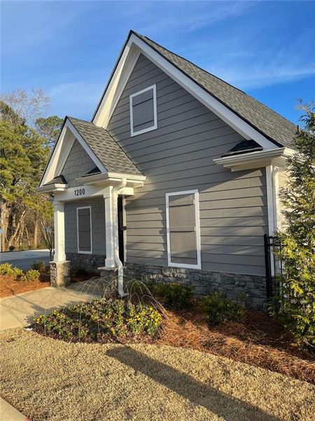Front exterior of a new home in , Lawrenceville, GA, highlighting curb appeal (Image 19). Front exterior of a new home in , Lawrenceville, GA, highlighting curb appeal (Image 19).