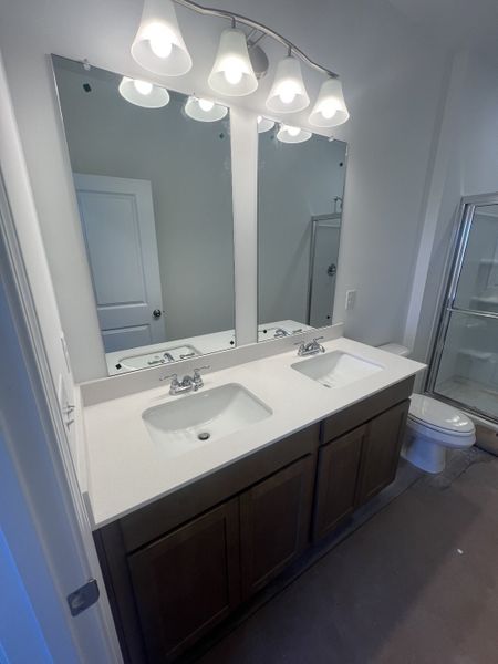 Double bowl vanity in primary bathroom