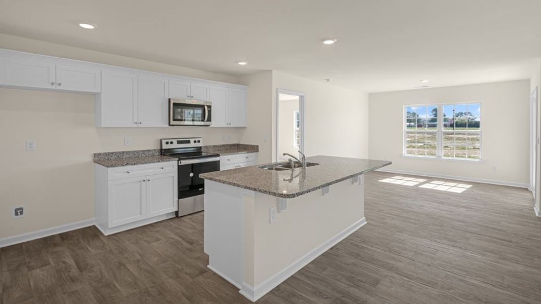 Representative furnished interior of a home built from the ARIA by D.R. Horton in Madeline Farm, New Bern (Image 4).