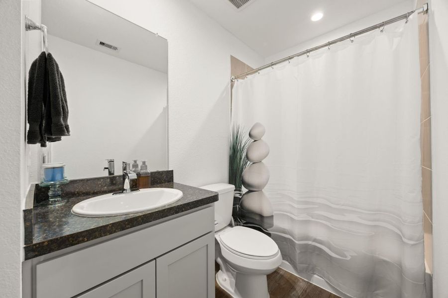 Furnished interior view inside a new home in Breckenridge Forest, Spring (Image 38).