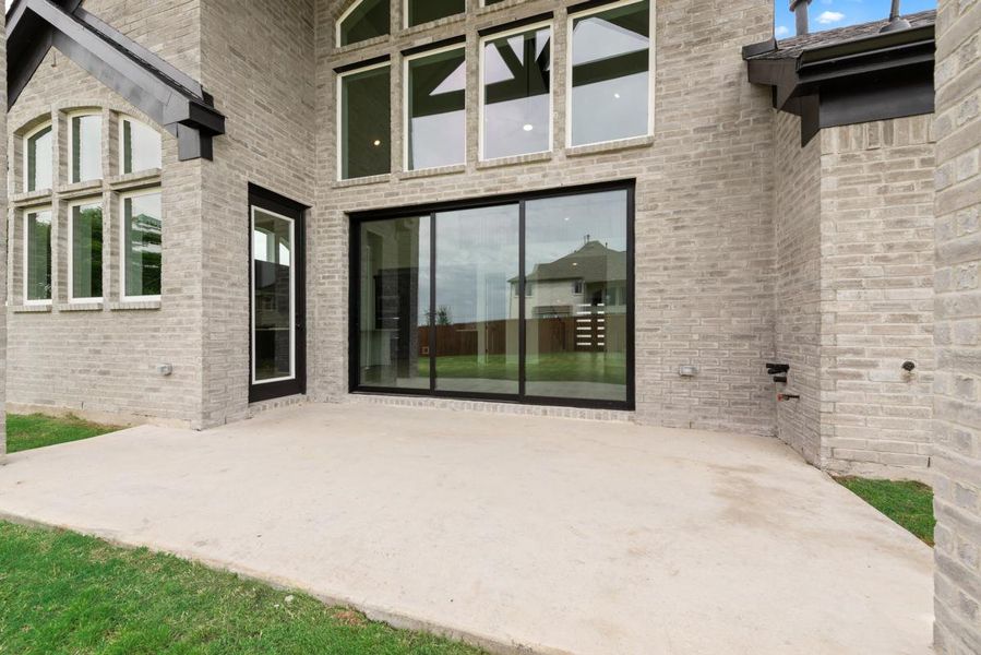 Exterior details and patio area of a home in Dominion of Pleasant Valley, Wylie (Image 3).
