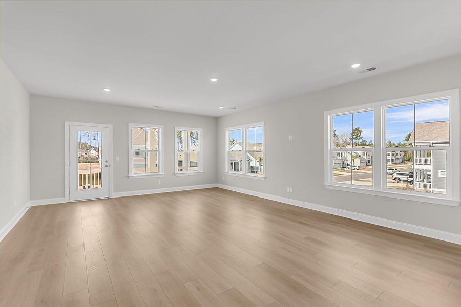 Spacious, unfurnished interior of a new home in Tidewater at Lakes of Cane Bay, Summerville (Image 27).