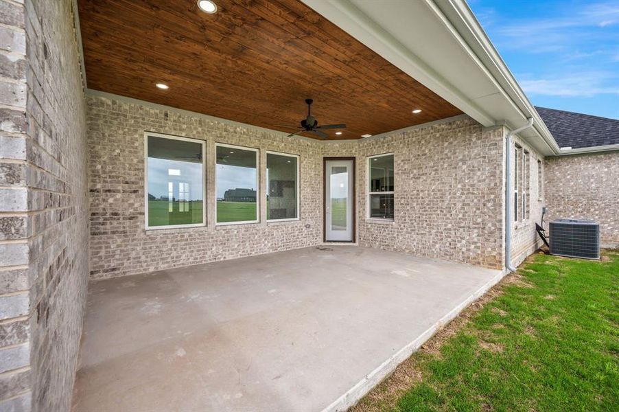 View of patio with central AC unit and ceiling fan View of patio with central AC unit and ceiling fan