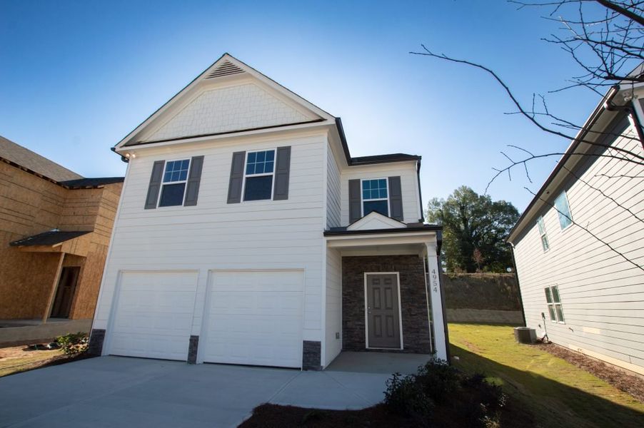 Representative exterior photo of a completed home built from the Greenbrier by Piedmont Residential in Meadowyn, Cartersville, GA (Image 16). Representative exterior photo of a completed home built from the Greenbrier by Piedmont Residential in Meadowyn, Cartersville, GA (Image 16).