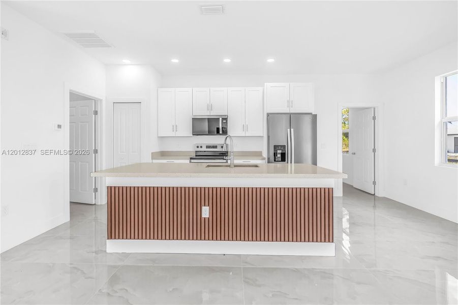 Furnished interior view inside a new home in , Lehigh Acres (Image 7).