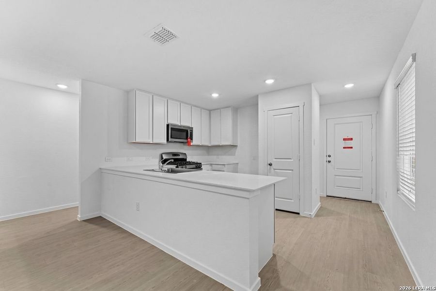 Furnished interior view inside a new home in Espada, San Antonio (Image 6).