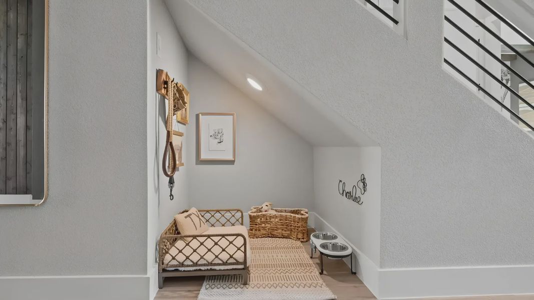 Representative furnished interior of a home built from the Melody by Chesmar Homes in Newhaven, Manor (Image 4).