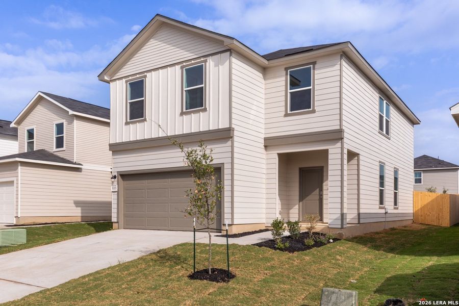 Front exterior of a new home in Southton Cove, Elmendorf, TX, highlighting curb appeal (Image 1). Front exterior of a new home in Southton Cove, Elmendorf, TX, highlighting curb appeal (Image 1).