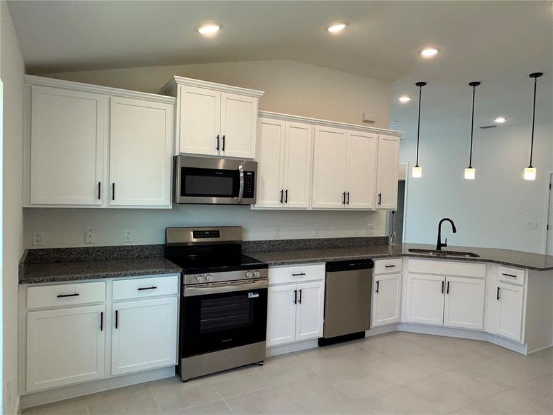 Furnished interior view inside a new home in Watercress Cove, North Port (Image 6).