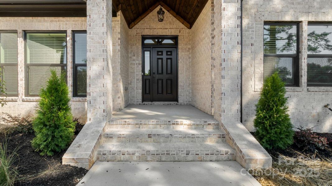 Front exterior of a new home in , Indian Trail, NC, highlighting curb appeal (Image 28). Front exterior of a new home in , Indian Trail, NC, highlighting curb appeal (Image 28).
