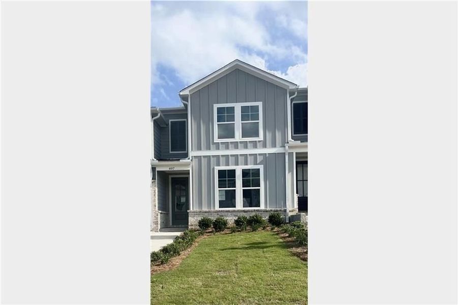 Front exterior of a new home in Stegall Village, Emerson, GA, highlighting curb appeal (Image 3).