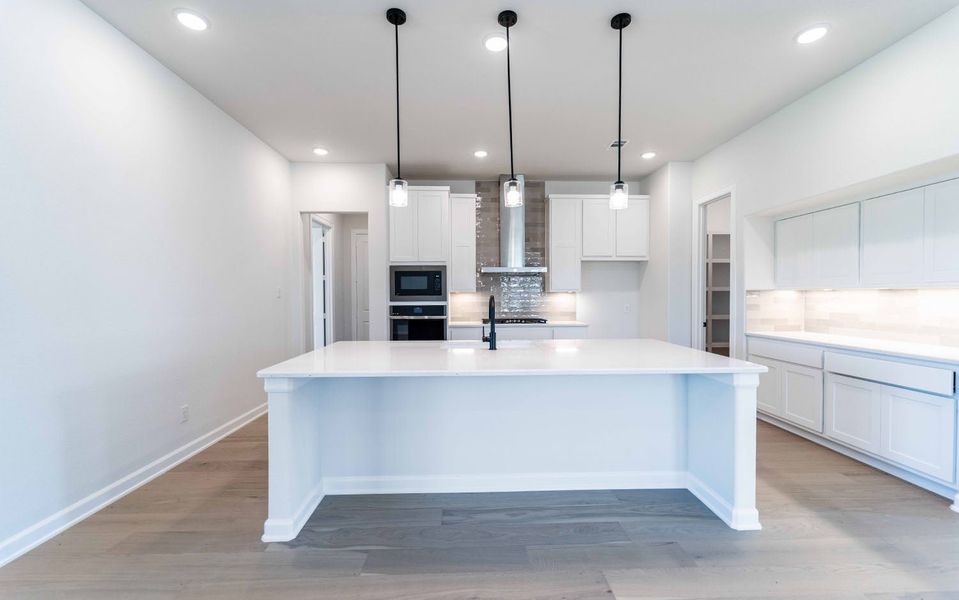 Furnished interior view inside a new home in Heath Golf & Yacht Club, Heath (Image 4).