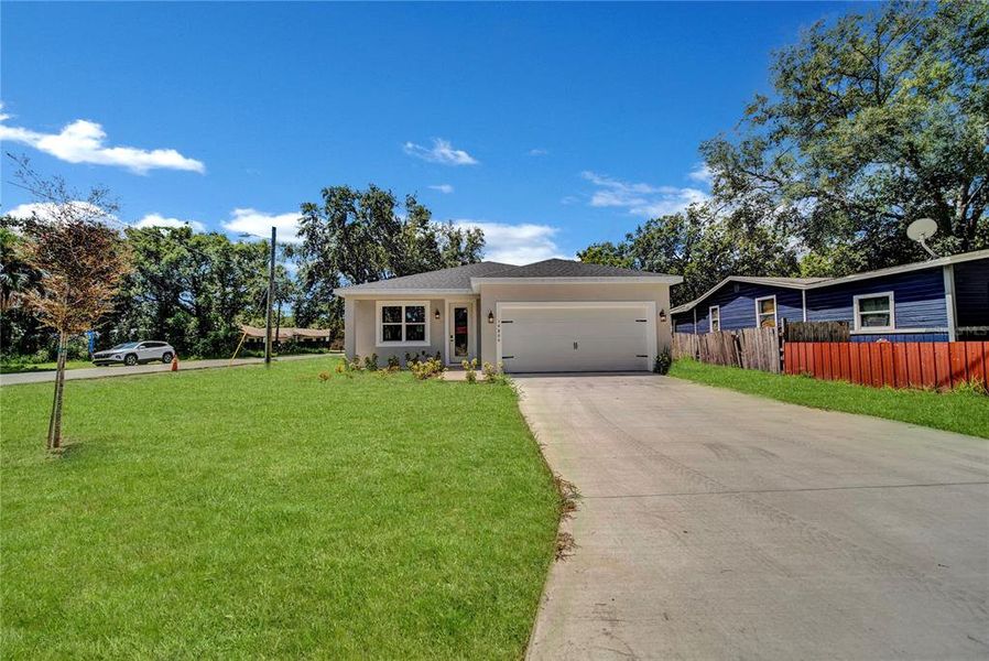 Front exterior of a new home in , Winter Garden, FL, highlighting curb appeal (Image 18).