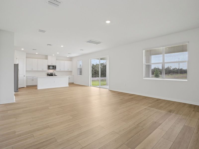 Spacious, unfurnished interior of a new home in Coasterra - Reserve Series, Palmetto (Image 12).