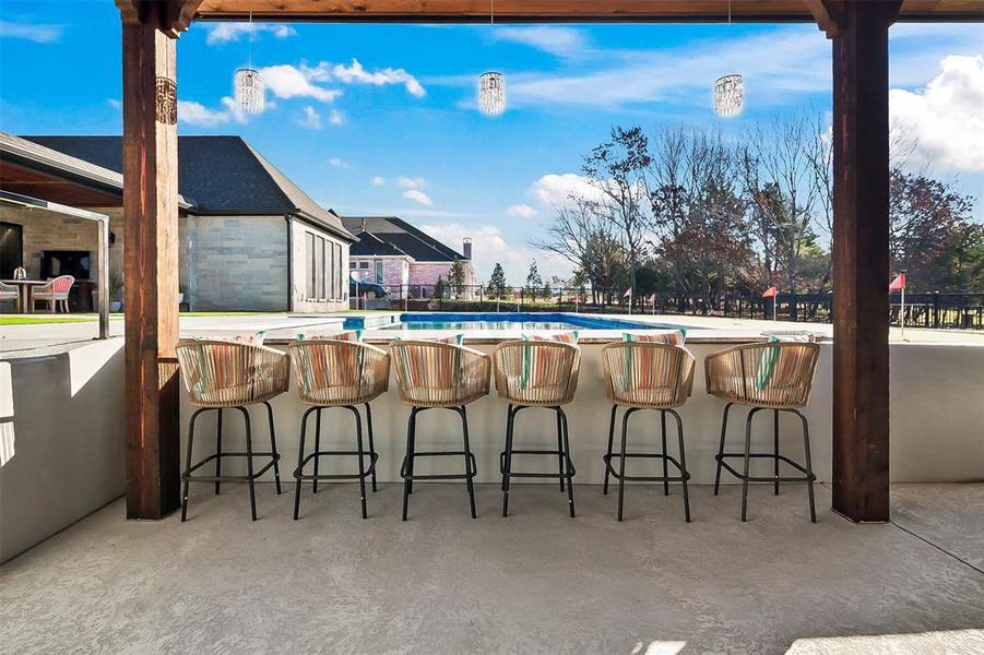 You can swim  or walk up to the bar on either side. The pool has underwater bar stools.