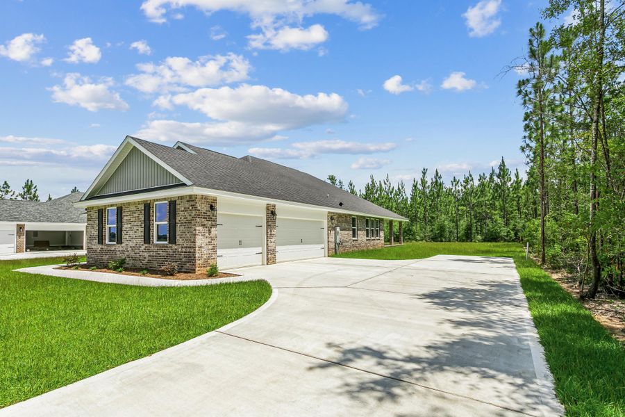 Representative exterior photo of a completed home built from the The Ruby Estate by Herbst Homes in Walther Reserve, Milton, FL (Image 19). Representative exterior photo of a completed home built from the The Ruby Estate by Herbst Homes in Walther Reserve, Milton, FL (Image 19).