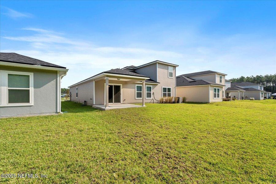 Exterior details and patio area of a home in Dunns Crossing, Jacksonville (Image 4). Exterior details and patio area of a home in Dunns Crossing, Jacksonville (Image 4).