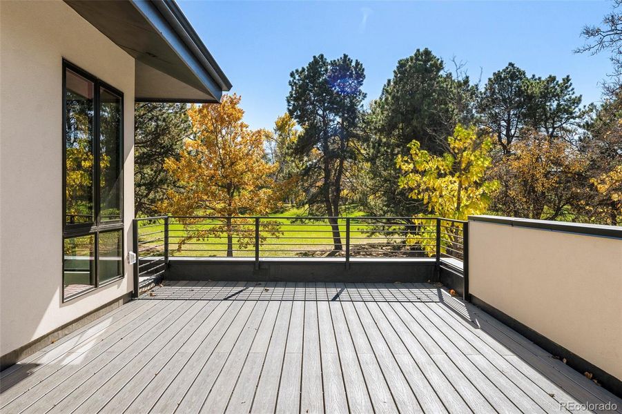 Roof deck weighted for a hot tub