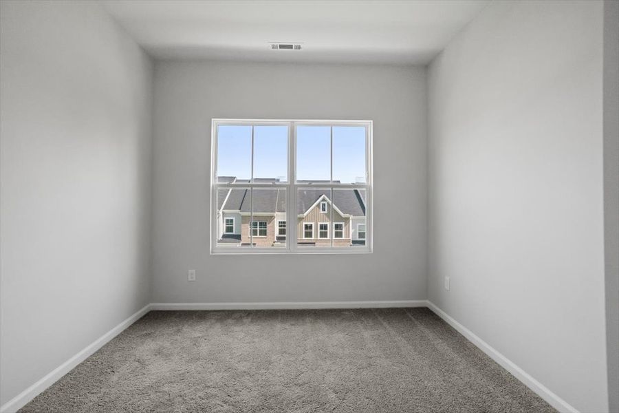 Spacious, unfurnished interior of a new home in Renaissance at White Oak, Garner (Image 20).