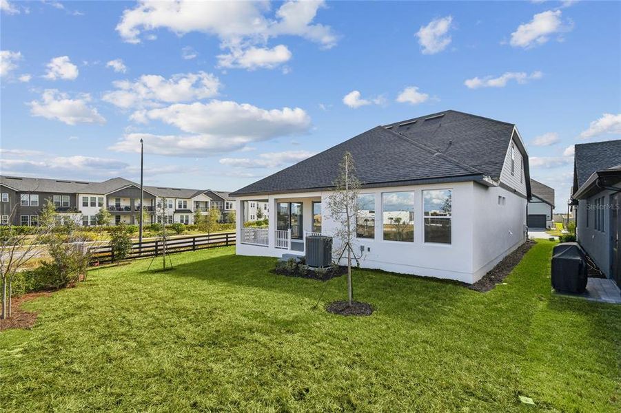 Exterior details and patio area of a home in John’s Lake North, Clermont (Image 21).