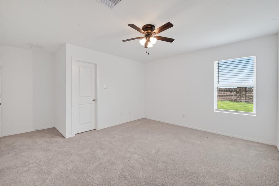 The very private primary suite has an ensuite bath and walk-in closet.
