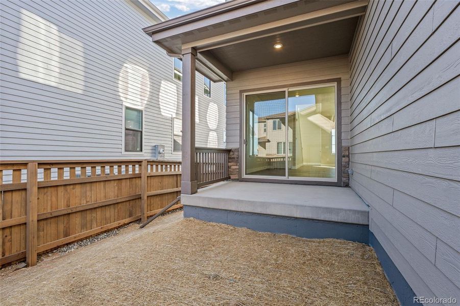 Exterior details and patio area of a home in Painted Prairie, Aurora (Image 26). Exterior details and patio area of a home in Painted Prairie, Aurora (Image 26).
