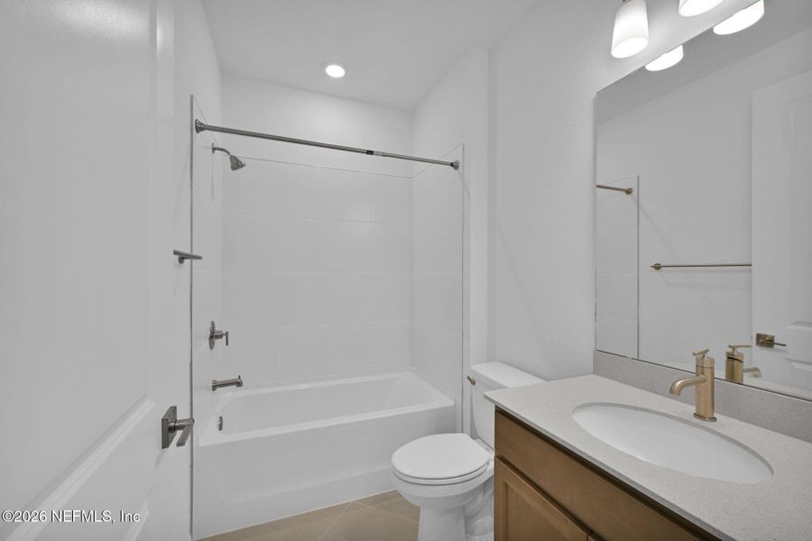 Furnished interior view inside a new home in Summer Bay at Grand Oaks, St. Augustine (Image 5).