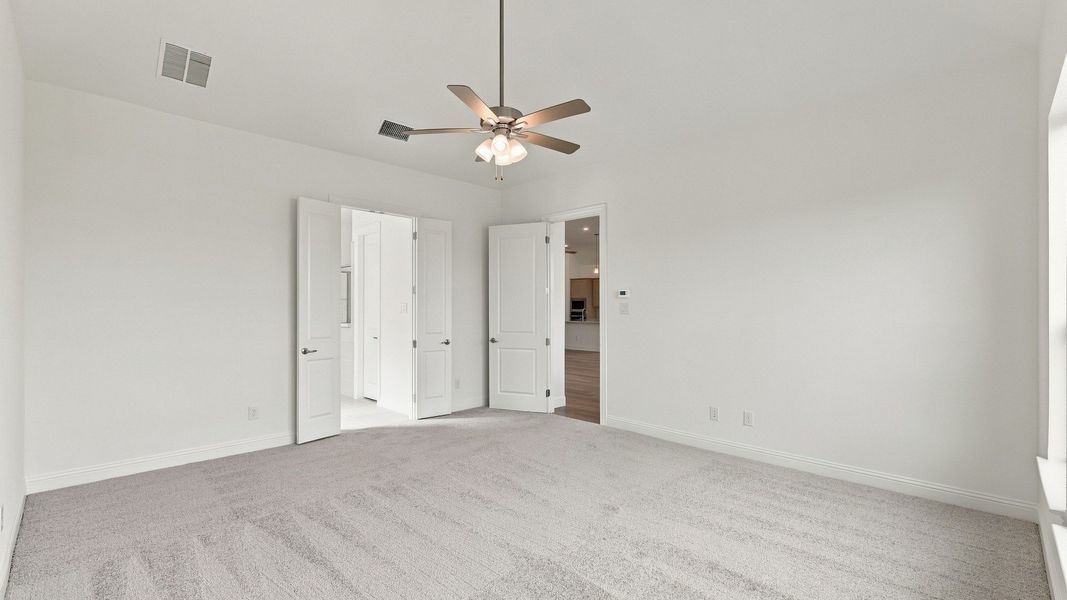 Furnished interior view inside a new home in Green Meadows Classic, Celina (Image 37).