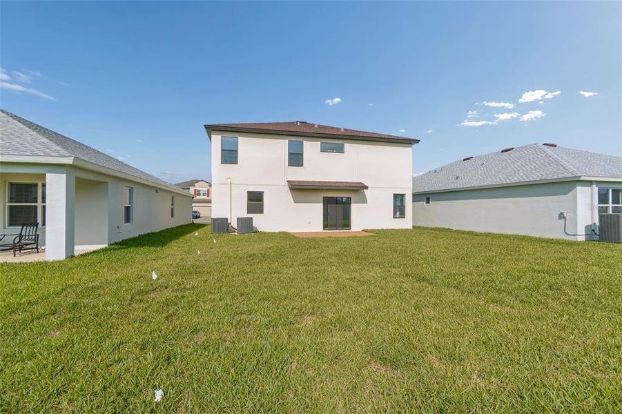 Exterior details and patio area of a home in Avalon West, Spring Hill (Image 3).