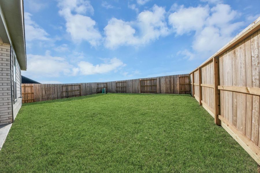 Come and see this spacious backyard with its beautiful covered patio. There is plenty of room for the kids to play and adults to relax. Perfect for your outdoor living space, patio furniture, bbq pit, and so much more. The possibilities are endless! Come and see this spacious backyard with its beautiful covered patio. There is plenty of room for the kids to play and adults to relax. Perfect for your outdoor living space, patio furniture, bbq pit, and so much more. The possibilities are endless!
