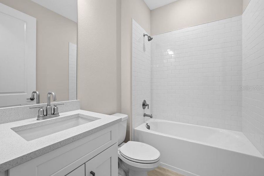 Furnished interior view inside a new home in Esplanade at Wiregrass Ranch, Wesley Chapel (Image 13).