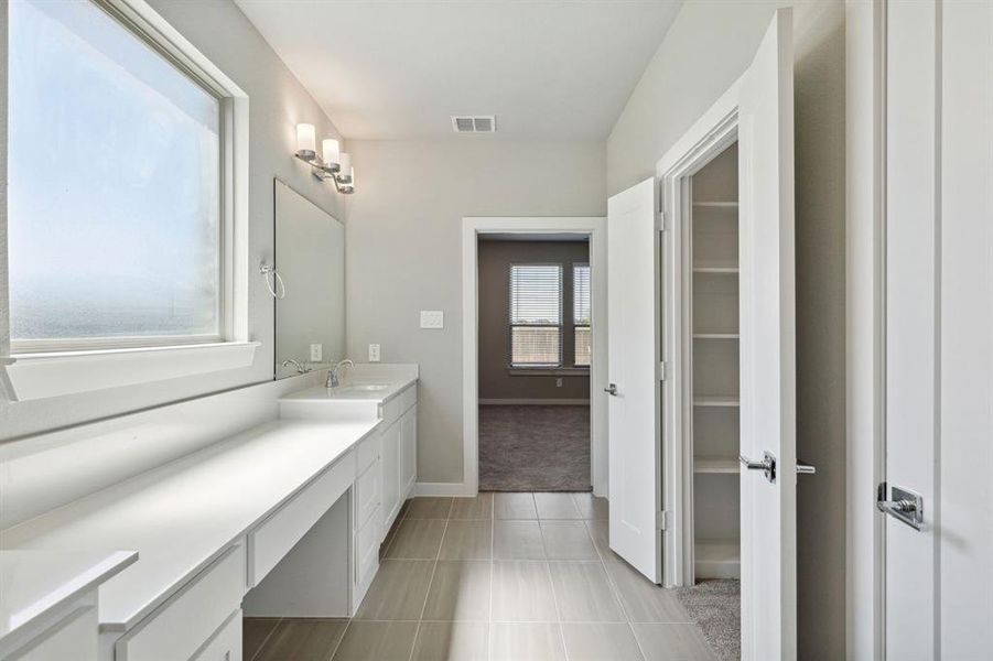 Primary Bathroom in the Henley home plan by Trophy Signature Homes – REPRESENTATIVE PHOTO Primary Bathroom in the Henley home plan by Trophy Signature Homes – REPRESENTATIVE PHOTO