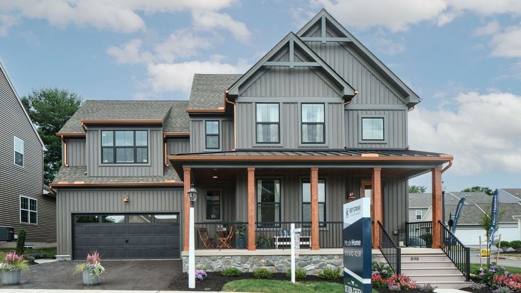 Representative exterior photo of a completed home built from the Sebastian by Keystone Custom Homes in Lakestone Cove, Belmont, NC (Image 14).
