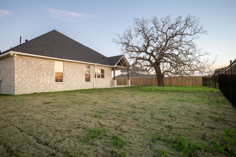 Representative exterior details of a home built from the The Addison by Reece Homes in Pebble Creek, College Station (Image 32).