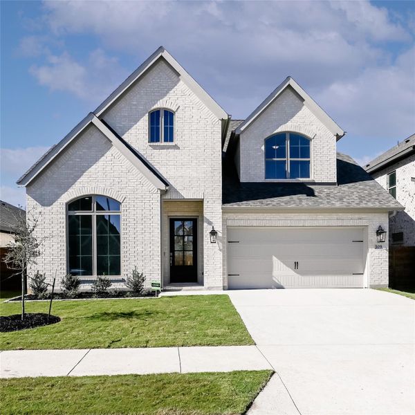 Front exterior of a new home in Juniper Springs, Lockhart, TX, highlighting curb appeal (Image 26).