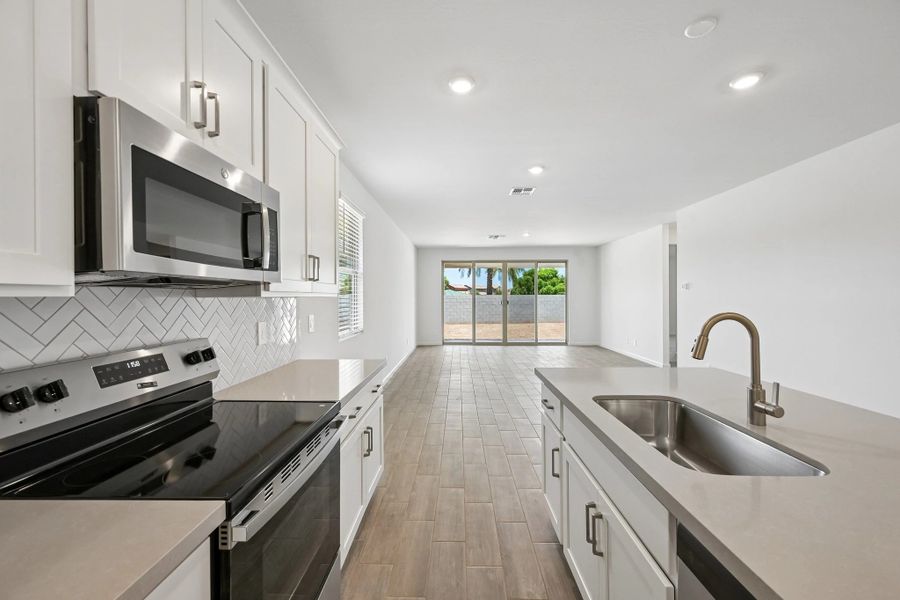 Kitchen, dining and great room Kitchen, dining and great room
