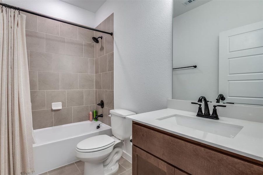 Furnished interior view inside a new home in Prairie Ridge at Goodland, Venus (Image 18).