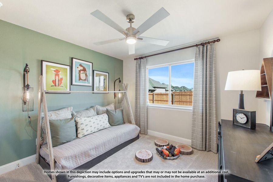 Children's bedroom with green accent wall, daybed frame, ceiling fan, and animal-themed wall art Children's bedroom with green accent wall, daybed frame, ceiling fan, and animal-themed wall art