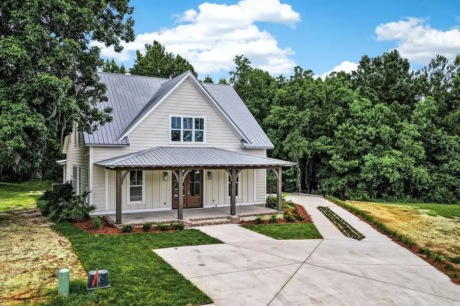 Front exterior of a new home in , Georgetown, SC, highlighting curb appeal (Image 2). Front exterior of a new home in , Georgetown, SC, highlighting curb appeal (Image 2).
