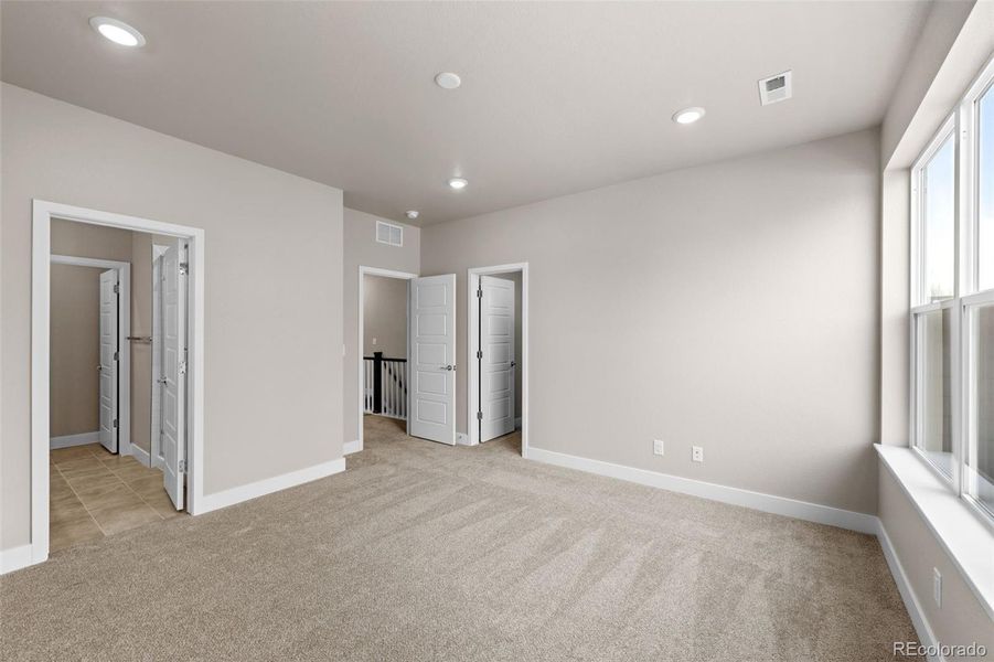 Spacious, unfurnished interior of a new home in Ralston Creek, Arvada (Image 32).