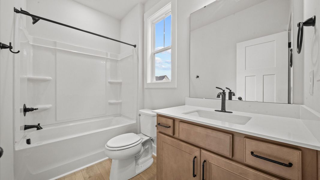 First-class guest bath featuring stylish fixtures and modern design elements