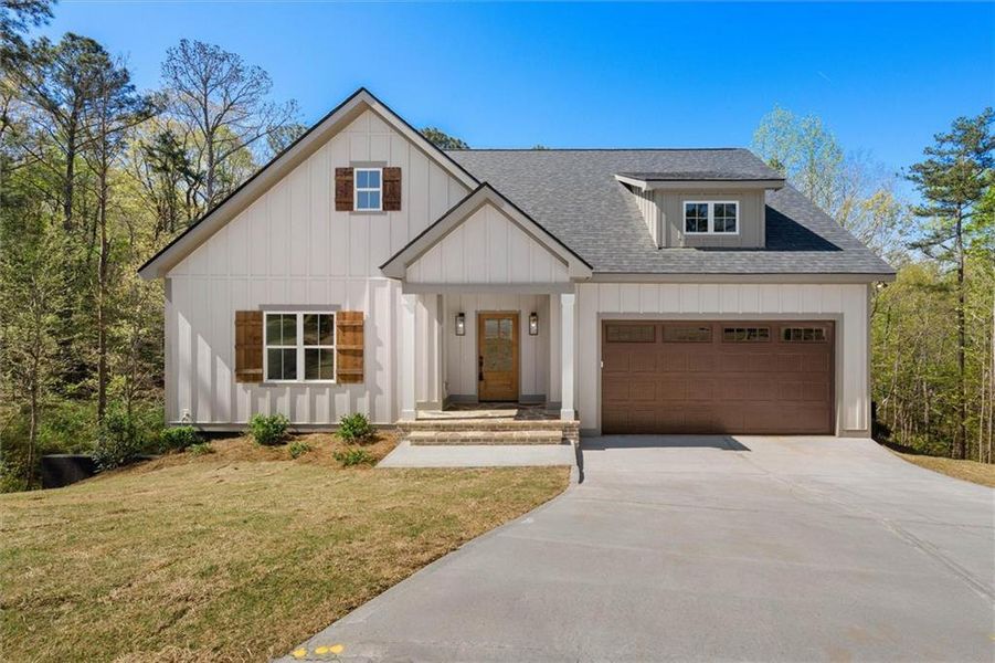 Front exterior of a new home in , Bremen, GA, highlighting curb appeal (Image 23).