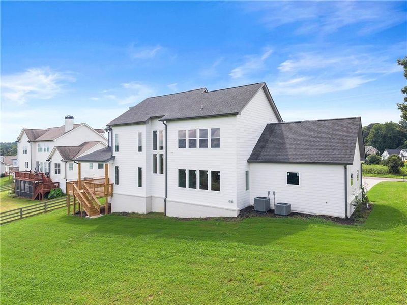 Front exterior of a new home in , Clermont, GA, highlighting curb appeal (Image 26).